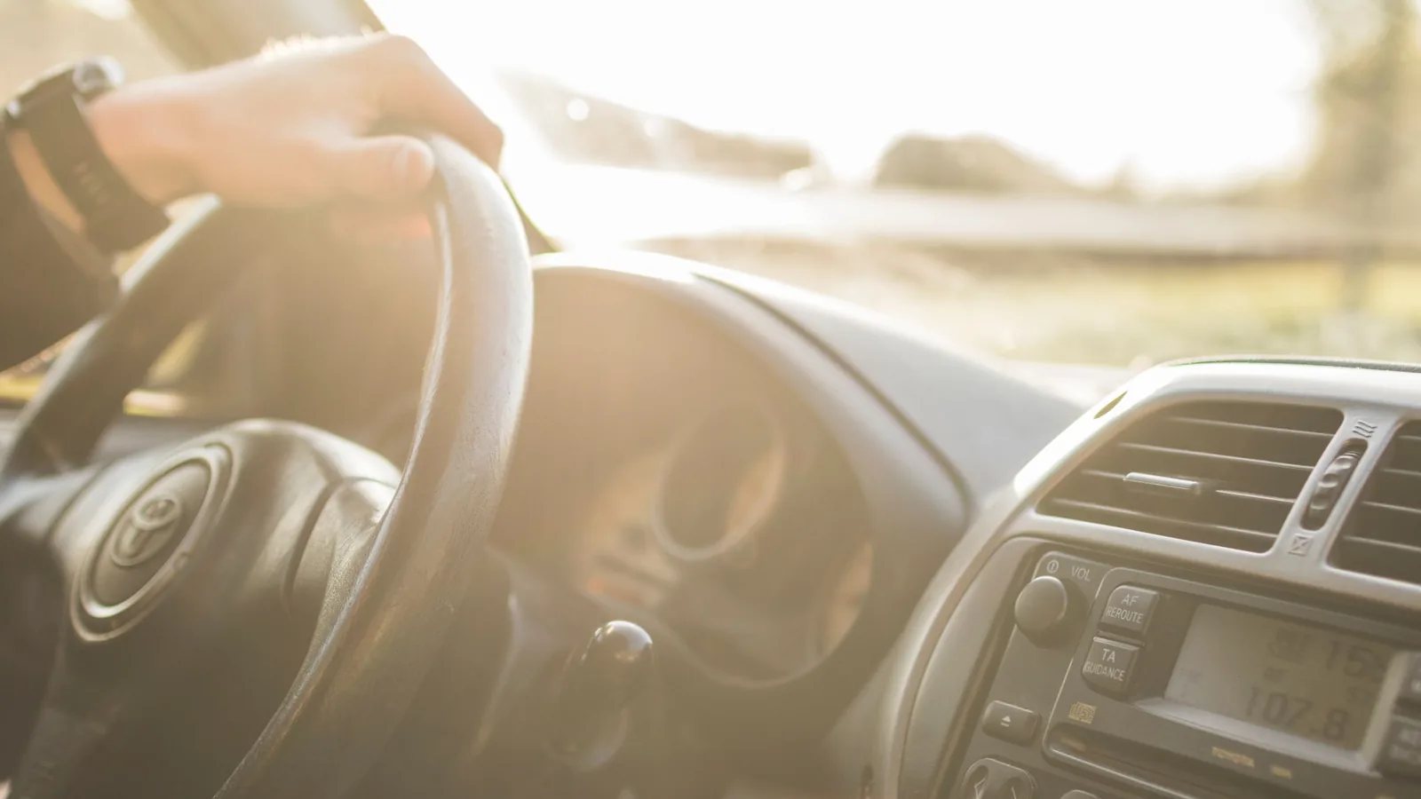 Car driving lesson in Geneva: hands on the steering wheel